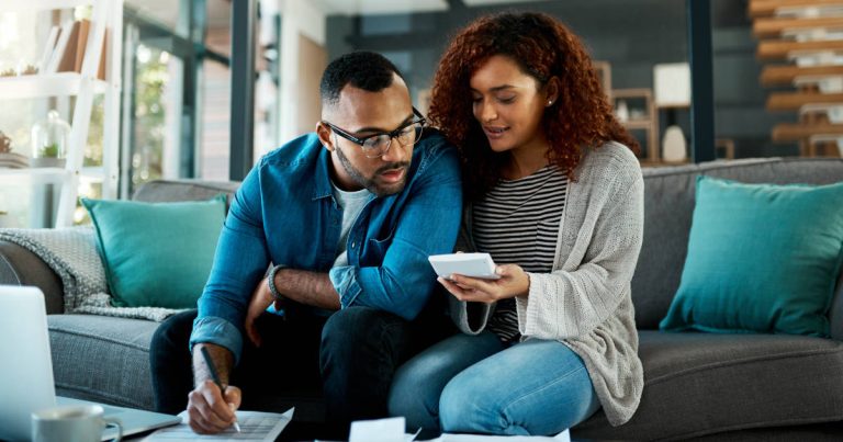 couple looking at finances